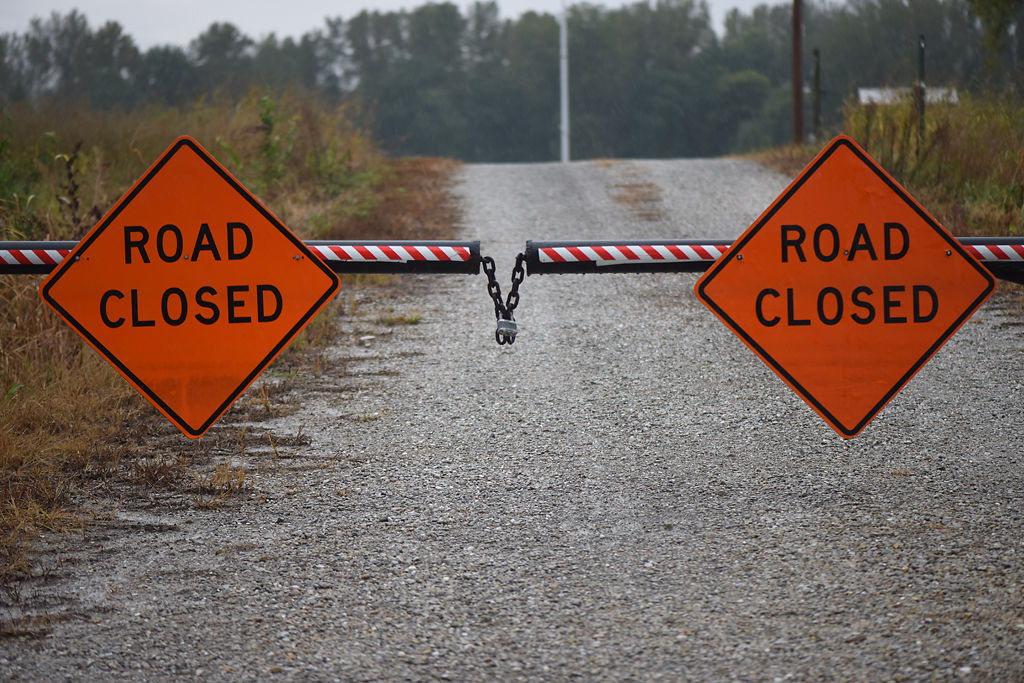A gate cuts off access on South Bush Landing Road leading up to the Missouri River